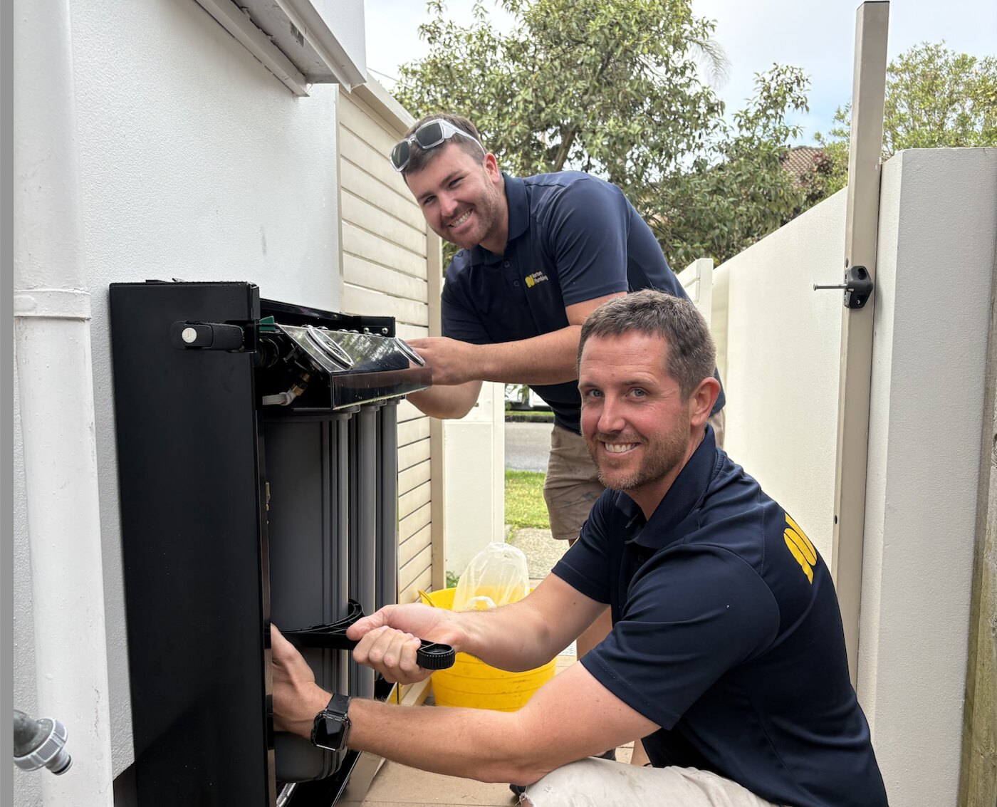 Adam and Blake from Norton Plumbing on a job at an Eastern Suburbs home